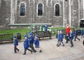 Little travelers in time with leader in London Tower