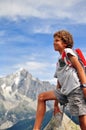 Little traveller in mountains Royalty Free Stock Photo