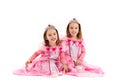 Little Twin Girls are dressed as princess in pink