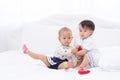 Little two Asian baby girls playing together at home Royalty Free Stock Photo