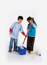 Little two workers with paint roller Royalty Free Stock Photo