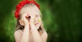 little ukrainian girl looking through heart gesture made with hands Gesture of love to Ukraine Royalty Free Stock Photo