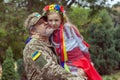 Little Ukrainian girl meets dad from the war Royalty Free Stock Photo