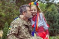 Little Ukrainian girl meets dad from the war Royalty Free Stock Photo