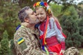 Little Ukrainian girl meets dad from the war