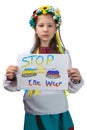 A little Ukrainian girl with tearful eyes holds a drawing with the inscription Royalty Free Stock Photo