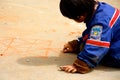 Little Vietnamese boys playing games on the path