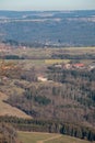 Little village and little castle in the middle of the german countryside with hills, forests, fields and meadows Royalty Free Stock Photo