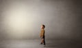 Little waggish kid in an empty room Royalty Free Stock Photo