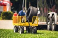 little wagon full of racing equipment at a local race track