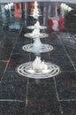 Little water fountains on the sidewalk at True North Square in downtown Winnipeg, Manitoba, Canada