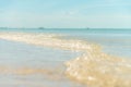 Little wave on the sunny beach Royalty Free Stock Photo