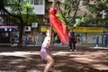 GUANGZHOU, CHINA - CIRCA MAY 2020: A little white girl practises kung-fu with a Chinese martial arts teacher Royalty Free Stock Photo