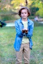 Little white hamster in the boyÃ¢â¬â¢s arms