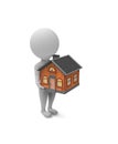 Little white man holds a house in his hands Royalty Free Stock Photo
