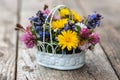 Little wild flower bouquet on wooden background Royalty Free Stock Photo