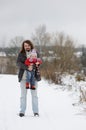 Little winter baby girl and her father Royalty Free Stock Photo