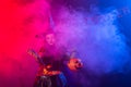 Little witch child cooking potion in the cauldron on Halloween. Royalty Free Stock Photo