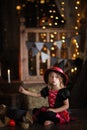 Little witch in costum and hats conjure pot, childhood hallowee Royalty Free Stock Photo