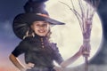 Little witch outdoors Royalty Free Stock Photo