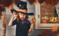 Little witch outdoors Royalty Free Stock Photo