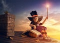 Little witch outdoors Royalty Free Stock Photo