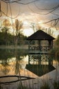Little Wooden Cabin on a Lake in Dordogne at Sunset