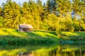 Little wooden cabin near river