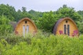 Little Wooden Huts at a Camp Site