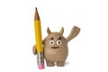 Little wooden monster with a pencil. 3D illustration.