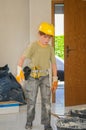 Little workman with security helmet Royalty Free Stock Photo