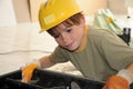 Little workman with security helmet Royalty Free Stock Photo