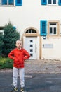 A little wriggles against the backdrop of a beautiful ancient historic building in Germany