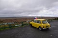 A little yellow mini cooper car Royalty Free Stock Photo