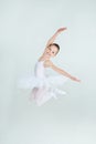 Little young ballerina poses on camera Royalty Free Stock Photo