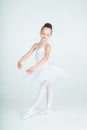 Little young ballerina poses on camera Royalty Free Stock Photo