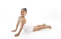 Little young cute girl ballet dancer dancing on white background