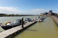 Littlehampton harbour with boats moored by the jetty