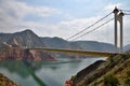 The Liujiaxia Bridge over a Yellow River in Gansu province in China Royalty Free Stock Photo