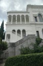 Livadia Palace with a beautiful landscaped garden in Crimea. Scenic view of a famous landmark of Crimea in summer