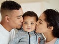 Live with all our love inside of you. Shot of a young family bonding with their baby boy at home. Royalty Free Stock Photo