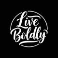 Live Boldly - Inspiring Hand-Lettered Quote on Black Background Royalty Free Stock Photo