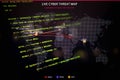 Live cyber threat map with real-time global attack data, highlighted malware, phishing, and exploit routes, overlaid with Royalty Free Stock Photo