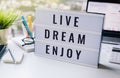 Live,dream,enjoy,ext on lightbox business motivation concepts