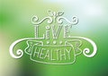 Live healthy - motivational and inspirational poster on blur green background.