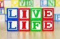 Live Life Spelled Out in Alphabet Building Blocks Royalty Free Stock Photo