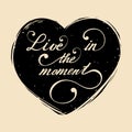 Live in the moment. Vector hand lettering inspirational and motivational typography poster on heart silhouette. Royalty Free Stock Photo