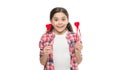 Live with no regrets, love with no limits. Small girl holding hearts on sticks. Cute girl with red hearts. Child hold