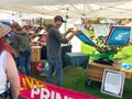 Live shirt printing vendor at Holland Tulip Festival Artisan Market