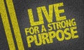 Live For a Strong Purpose written on the road Royalty Free Stock Photo